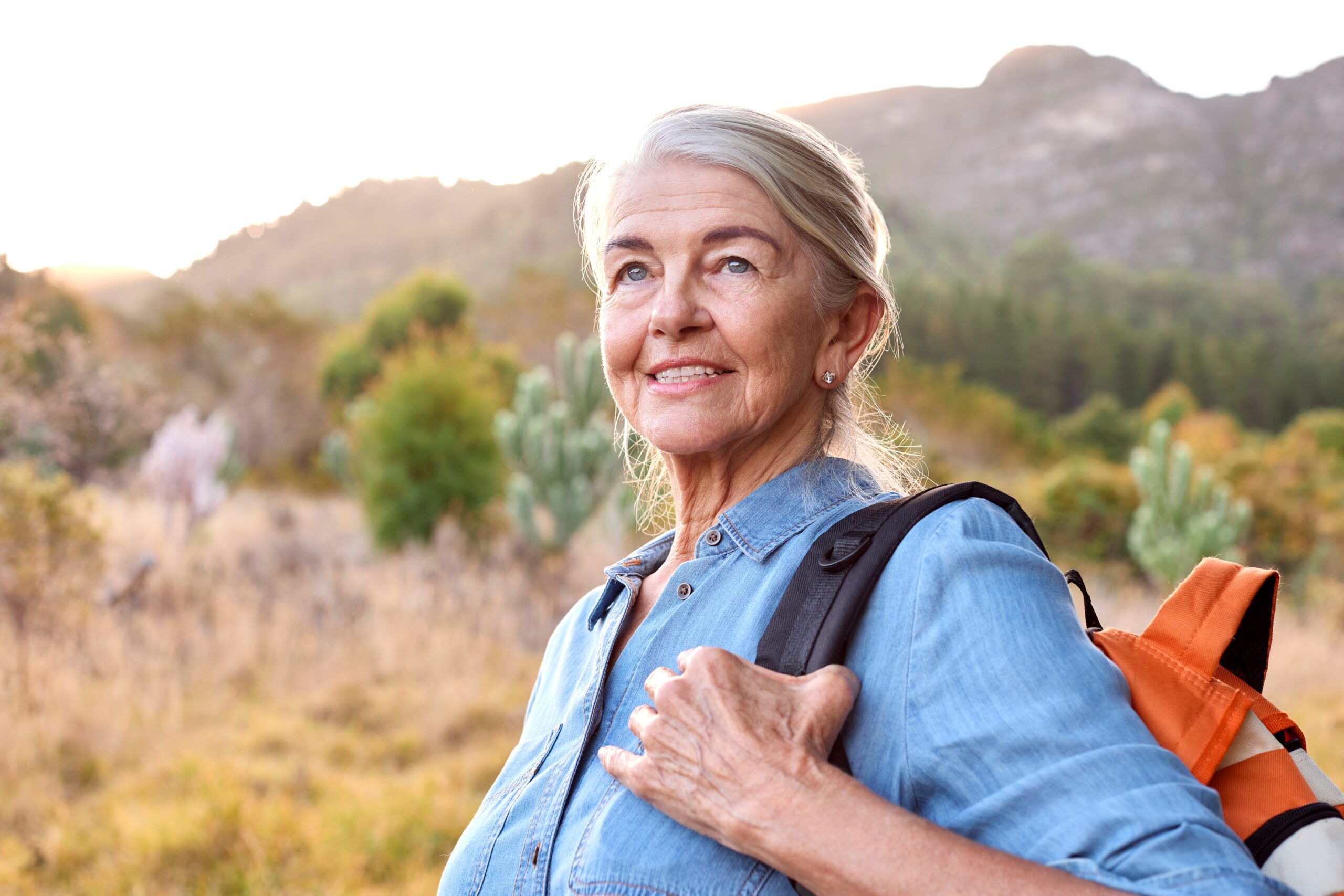 senior woman travel with backpack